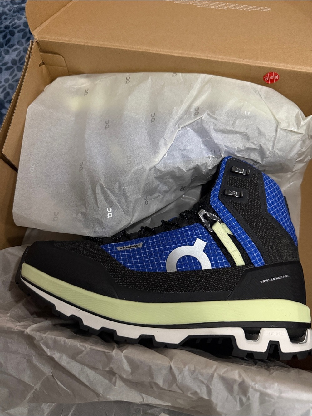 On Running Mid-Top Trail Boot in Blue and Black with Lime Accents